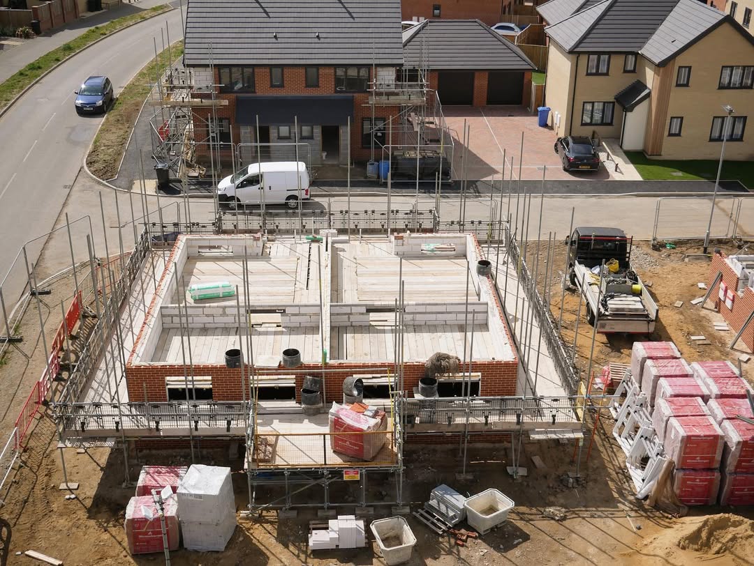 Aerial view of foundations and early construction
