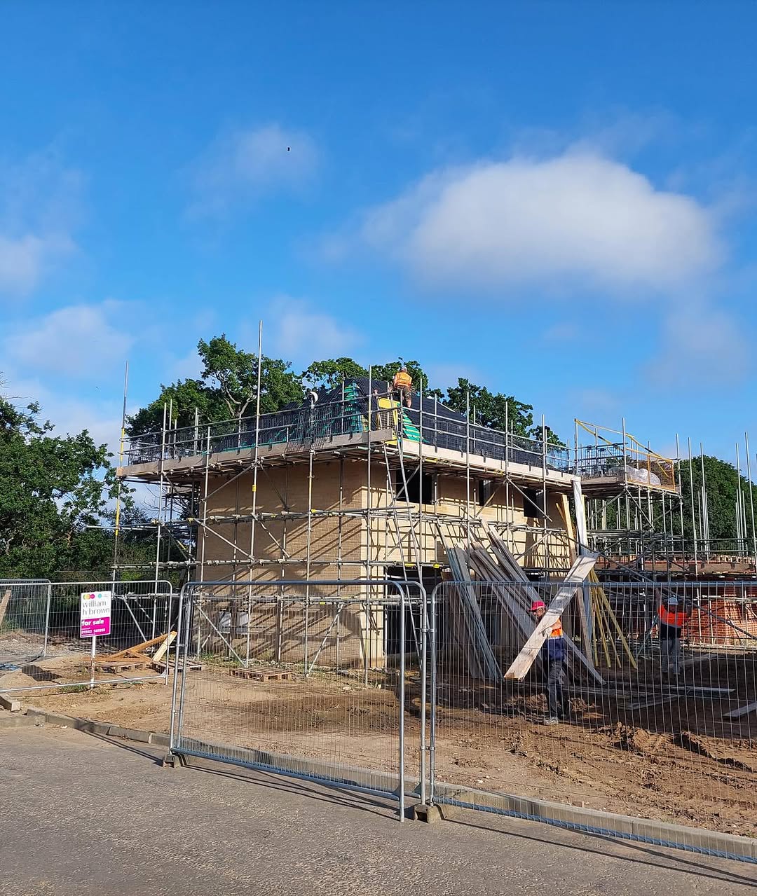 House under construction with full scaffolding