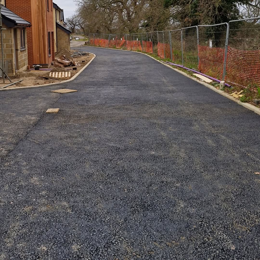 New tarmac road through Woods Meadow development